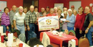 Money Raised to Help St. Maurus Parish